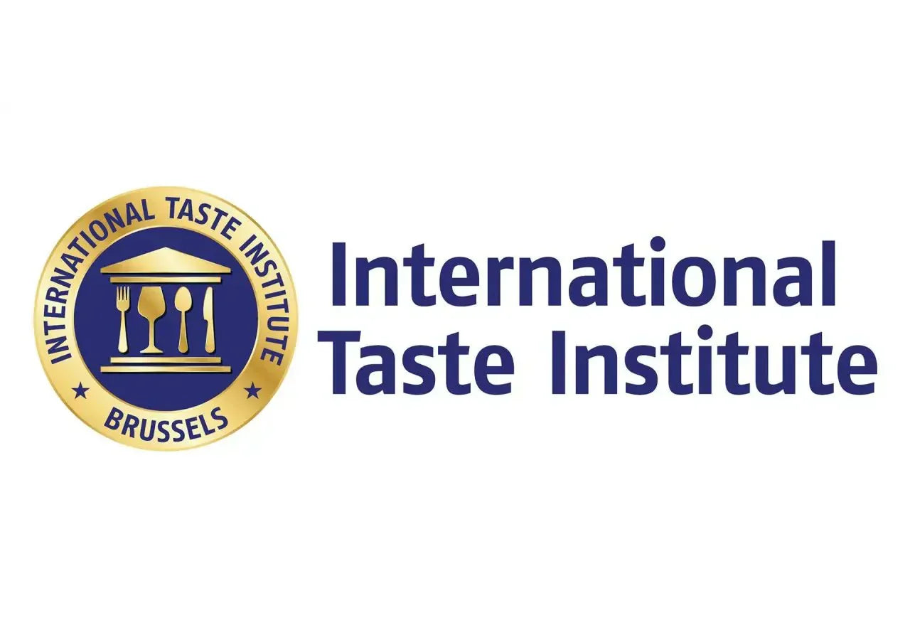 International Taste Institute Logo mit goldener Gabel und Messer auf Teller, daneben Schriftzug in Blau.
