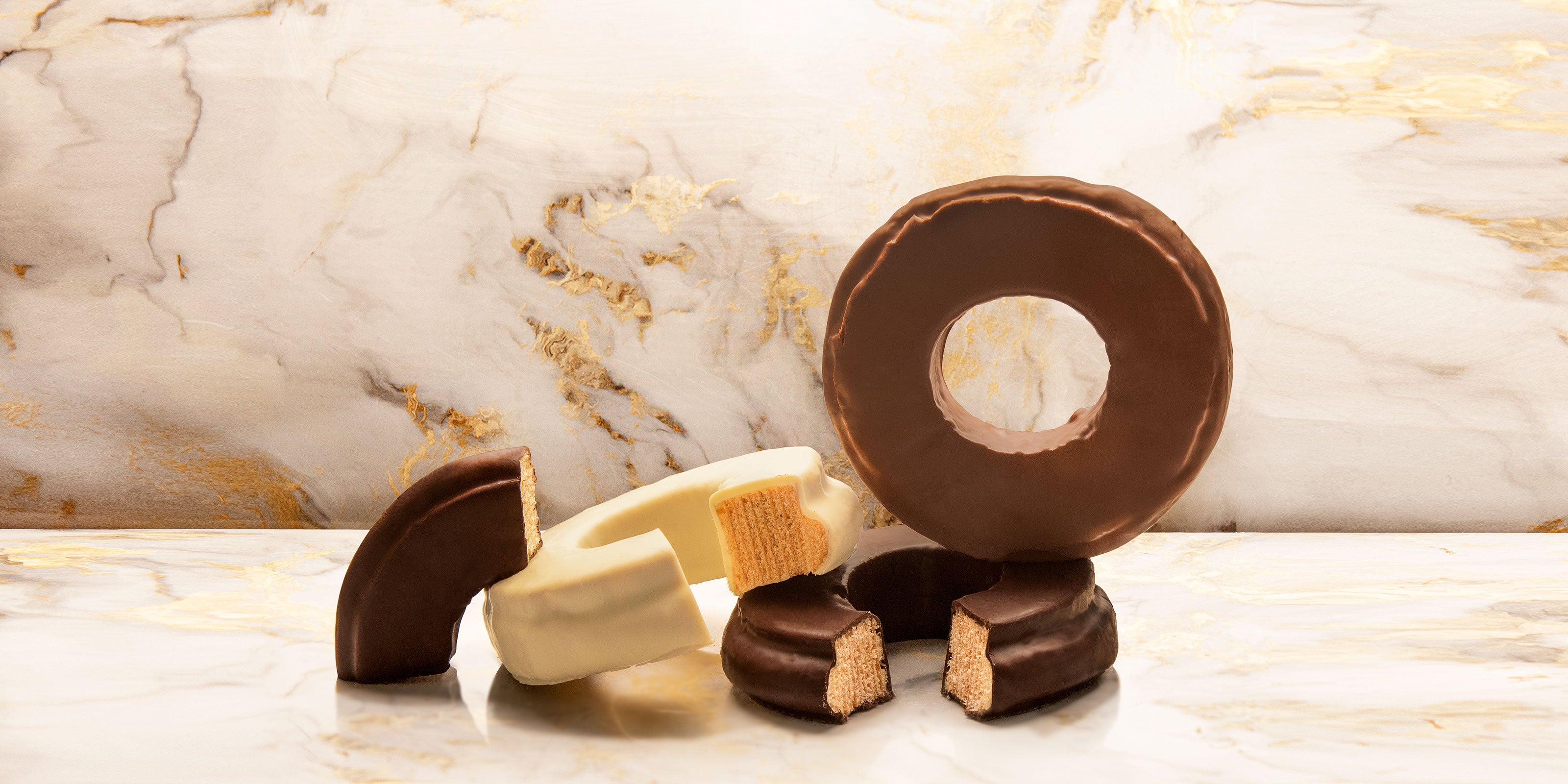 Rausch dreierlei Baumkuchen auf Marmor