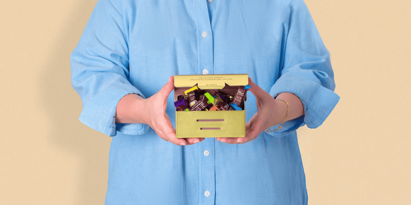 Rausch B2B Banner Goldbox in Händen