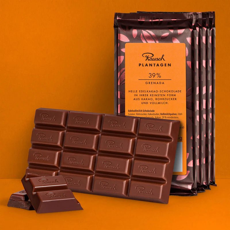 Bundle aus Rausch Plantagen Grenada 39% auf orangem Hintergrund.