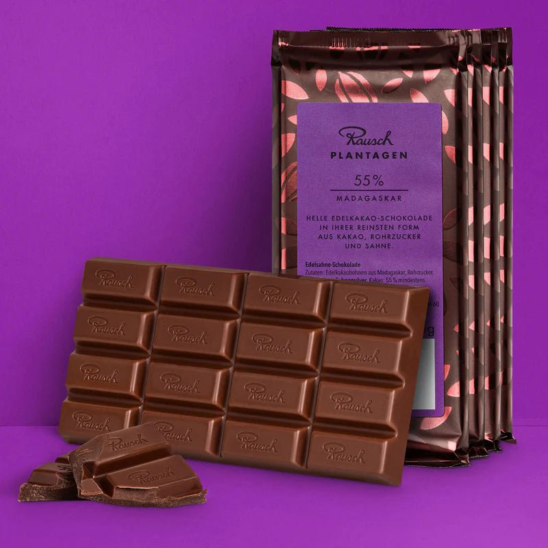 Bundle aus Rausch Plantagen Madagaskar 55% auf lila Hintergrund.