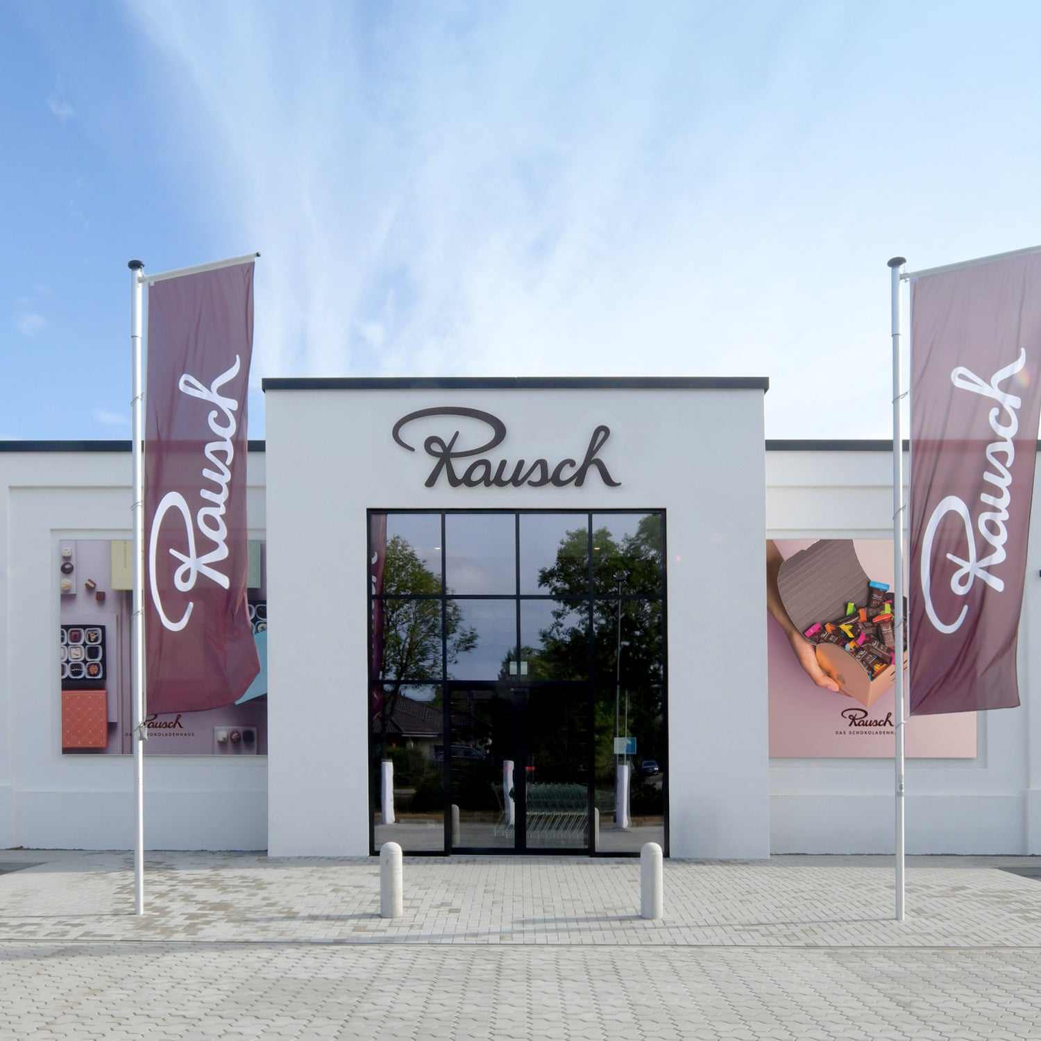 Schokoladenhaus Peine - mit wehenden Fahnen davor