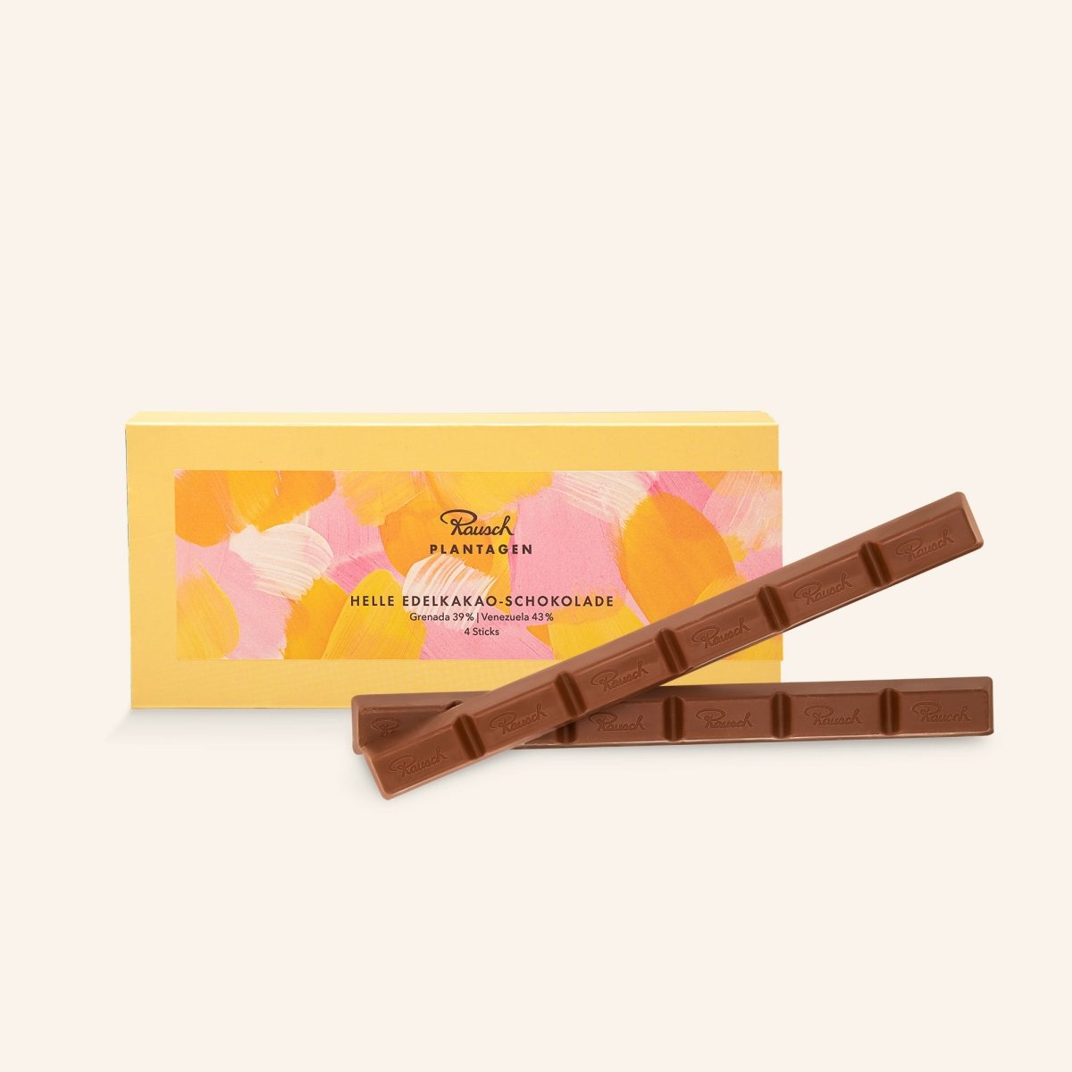 Gelbe Verpackung befüllt mit Rausch Edelkakao-Schokolade-Sticks Vollmilch