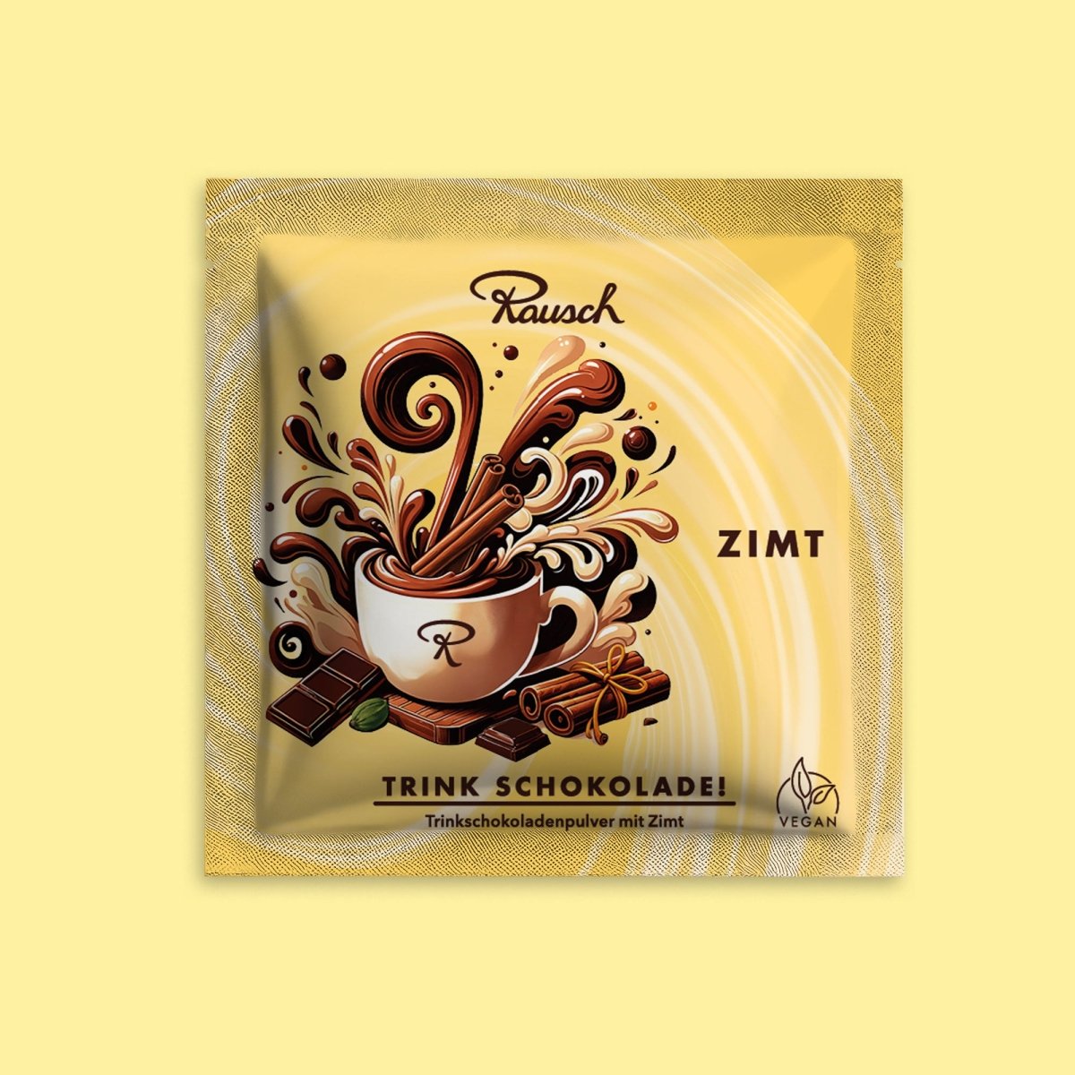 Trinkschokolade "Zimt" in gelbem Sachet auf farblich passendem Hintergrund.