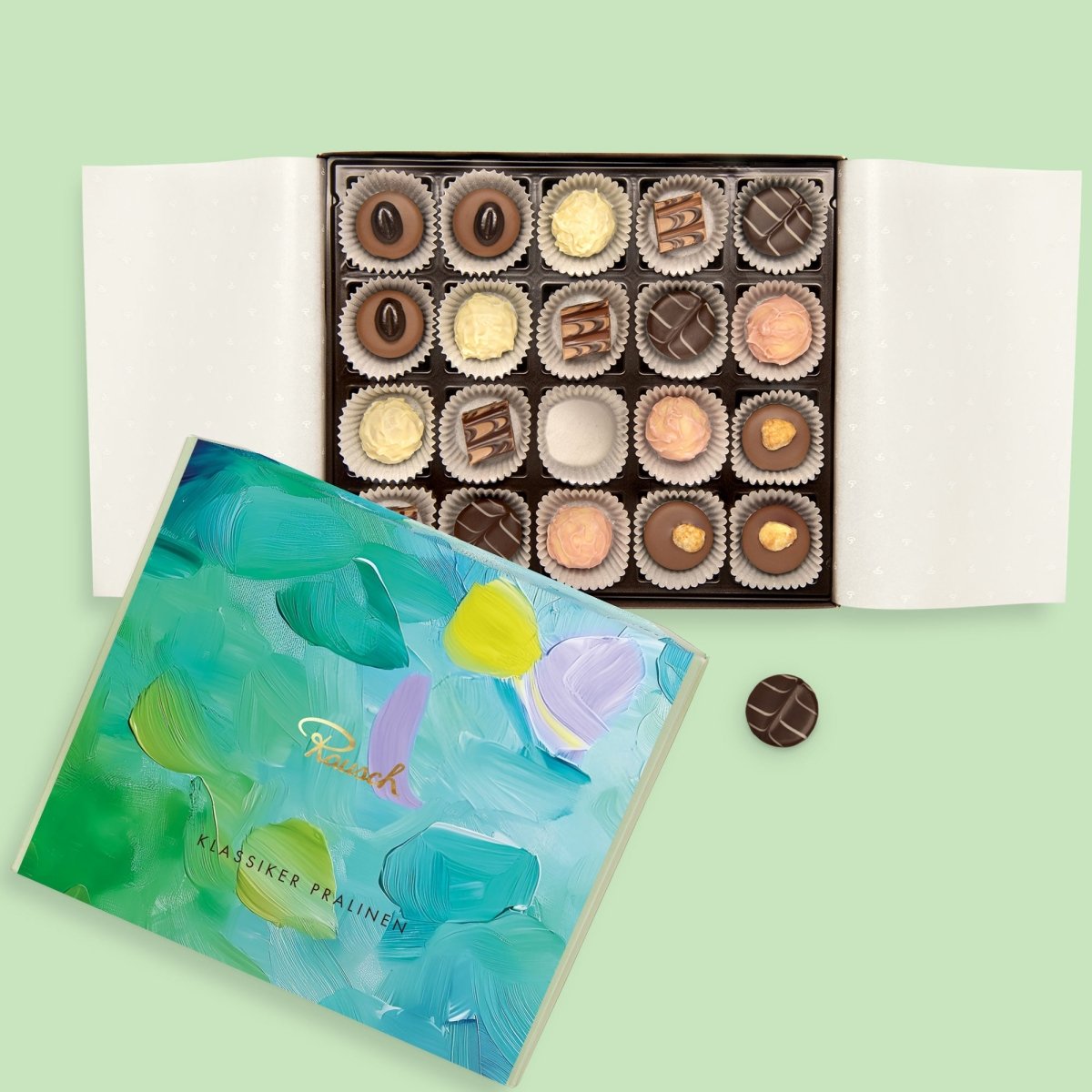 Rausch Pralinenschachtel türkis befüllt mit verschiedene Pralinen