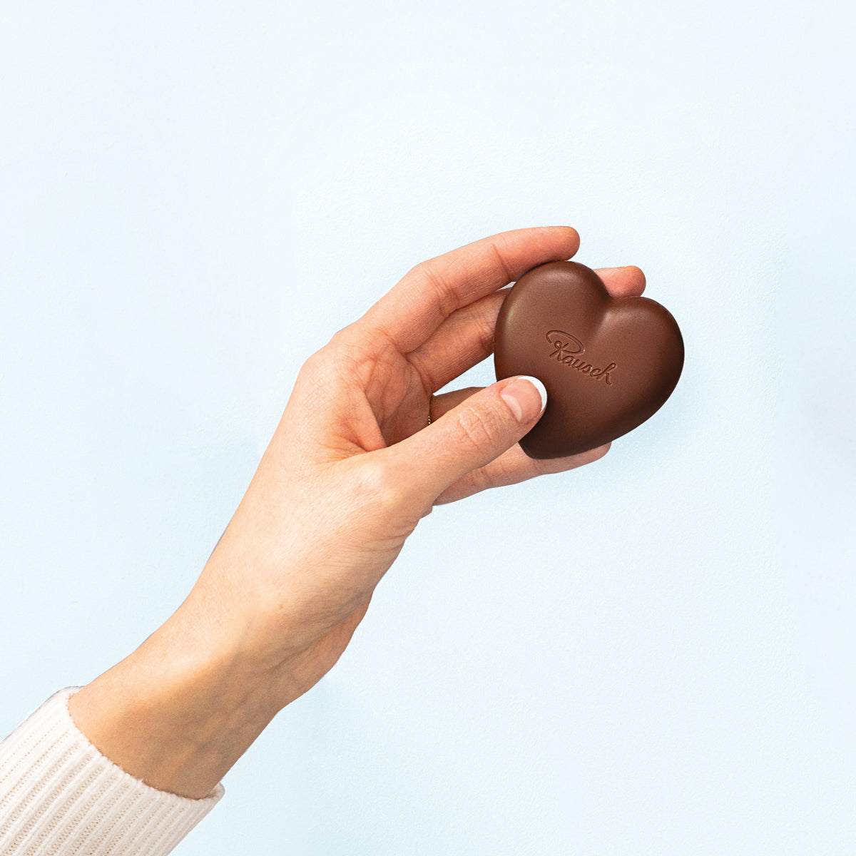 Rausch B2B Motiv Schokoladenherz in Hand