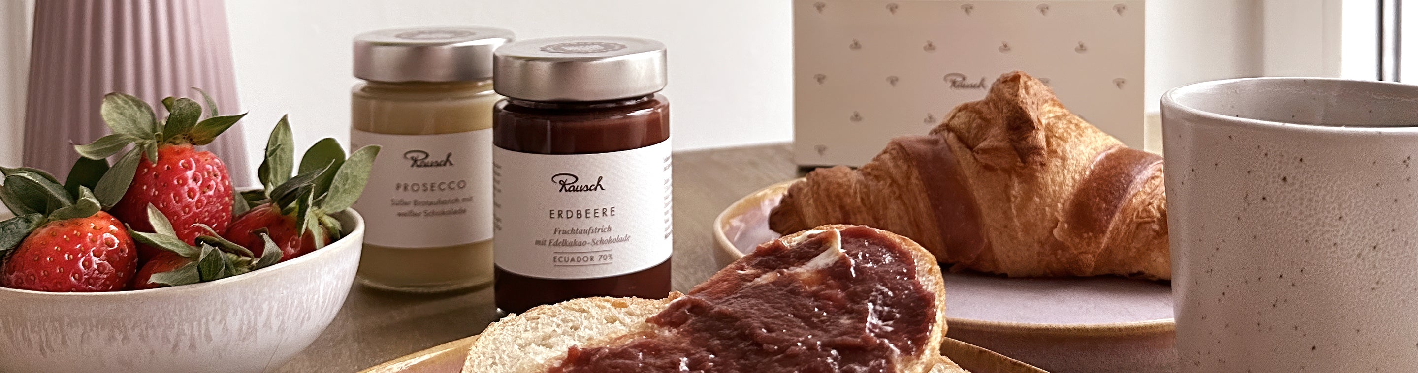 Rausch Banner Aufstriche und Früchte - Frühstückstisch